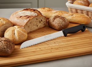 Brotmesser Bandstahl Herder Solingen 29,5cm rostfrei Wellenschliff Kunststoffgriff